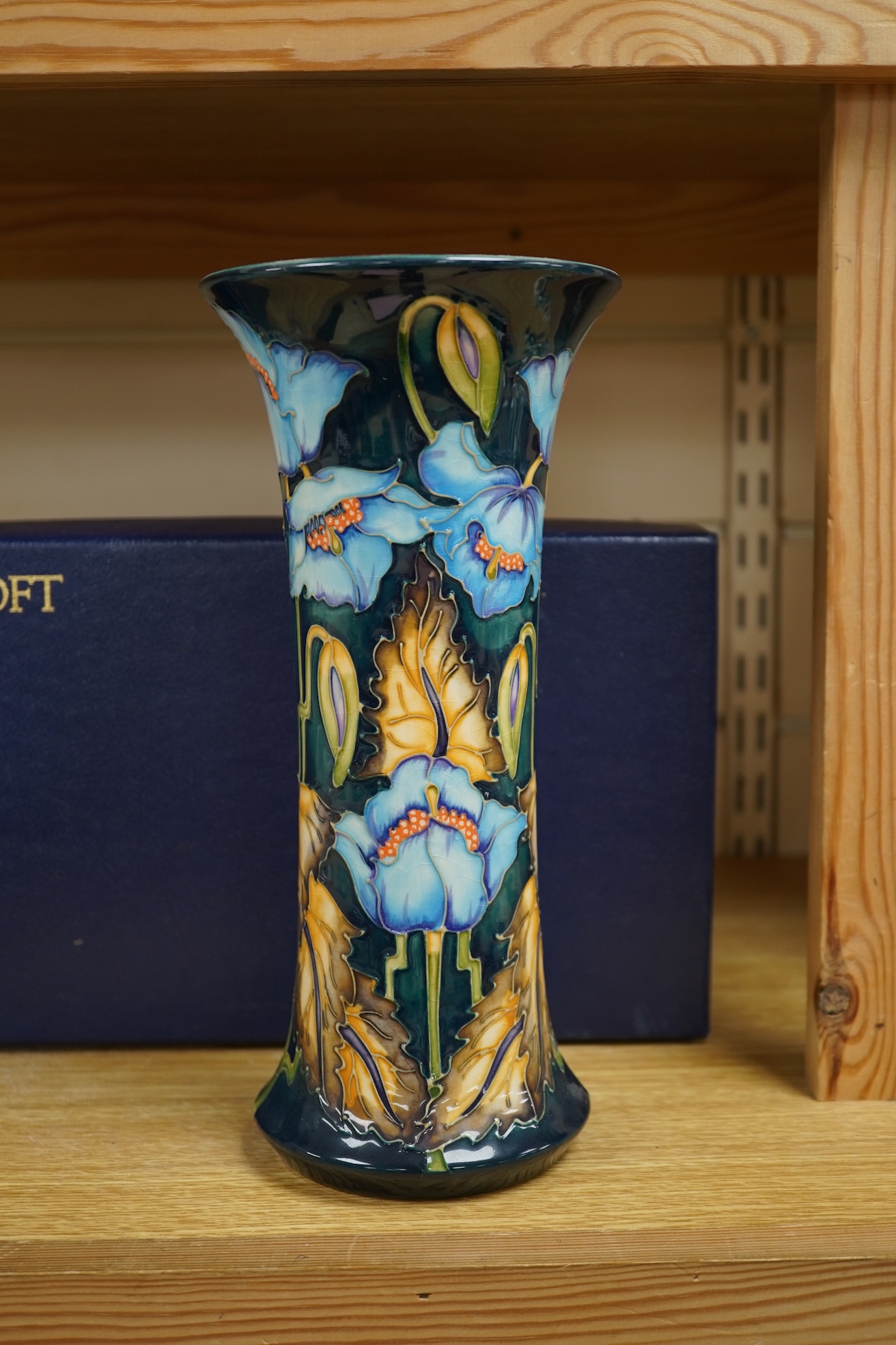 A Moorcroft ‘Blue Rhapsody’ vase, designed by Philip Gibson, 2001, created for the collectors club. Boxed. 26cm tall.